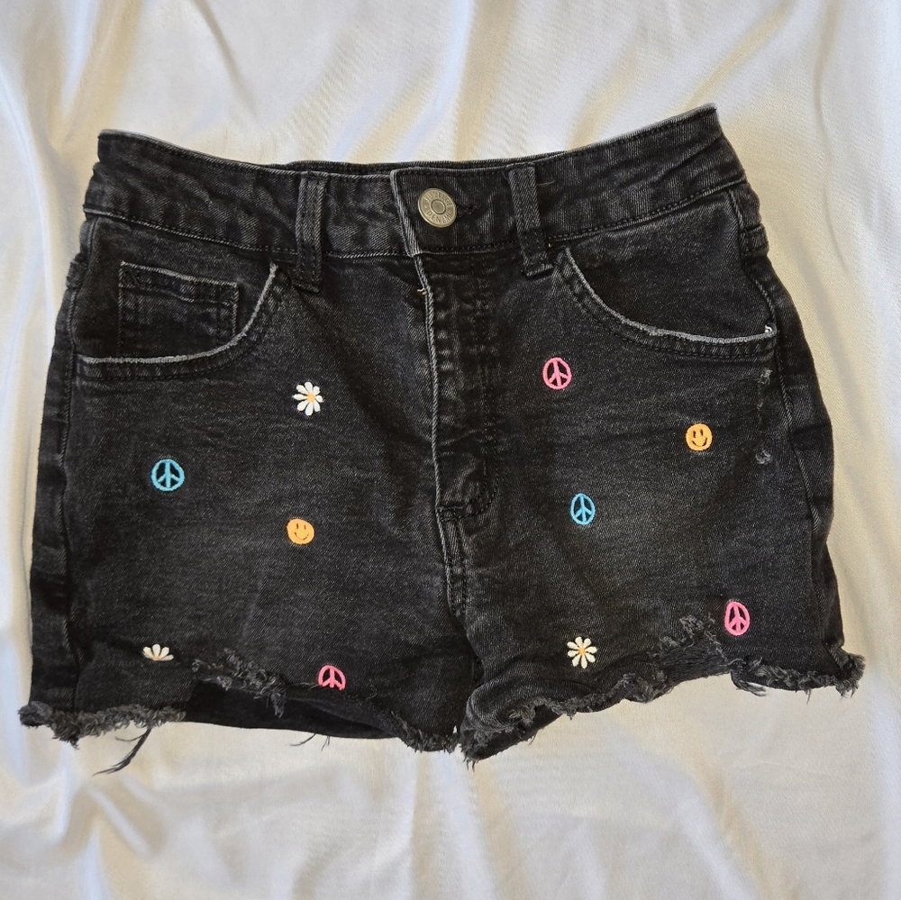 Justice Black Cut Off Denim Shorts with Embroidered Peace, Smiley Face And Daisy